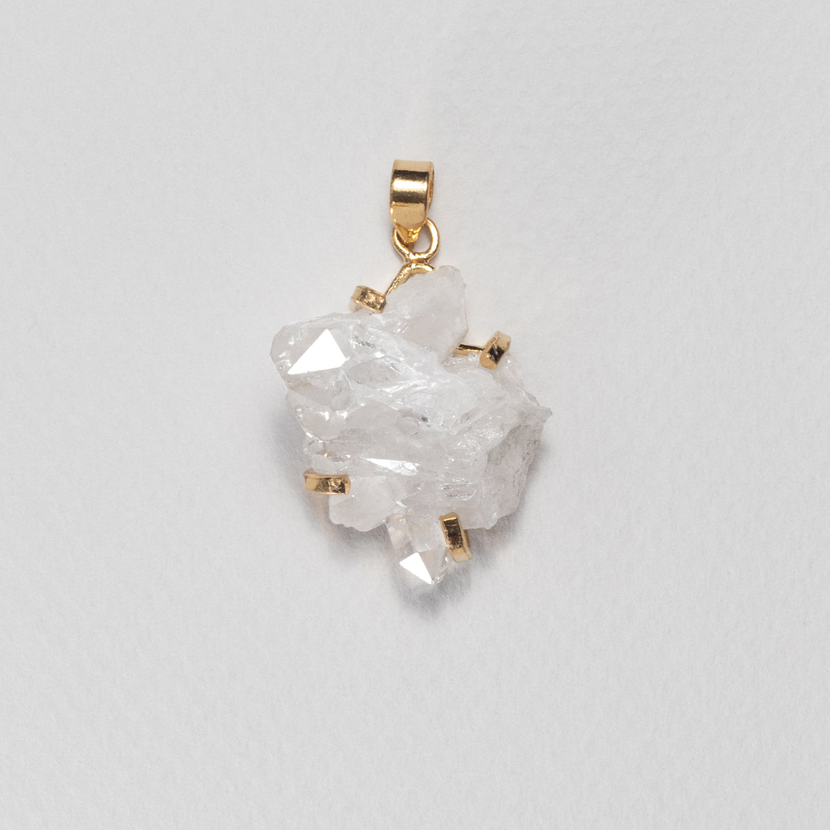 Pendentif en cristal de roche en grappe