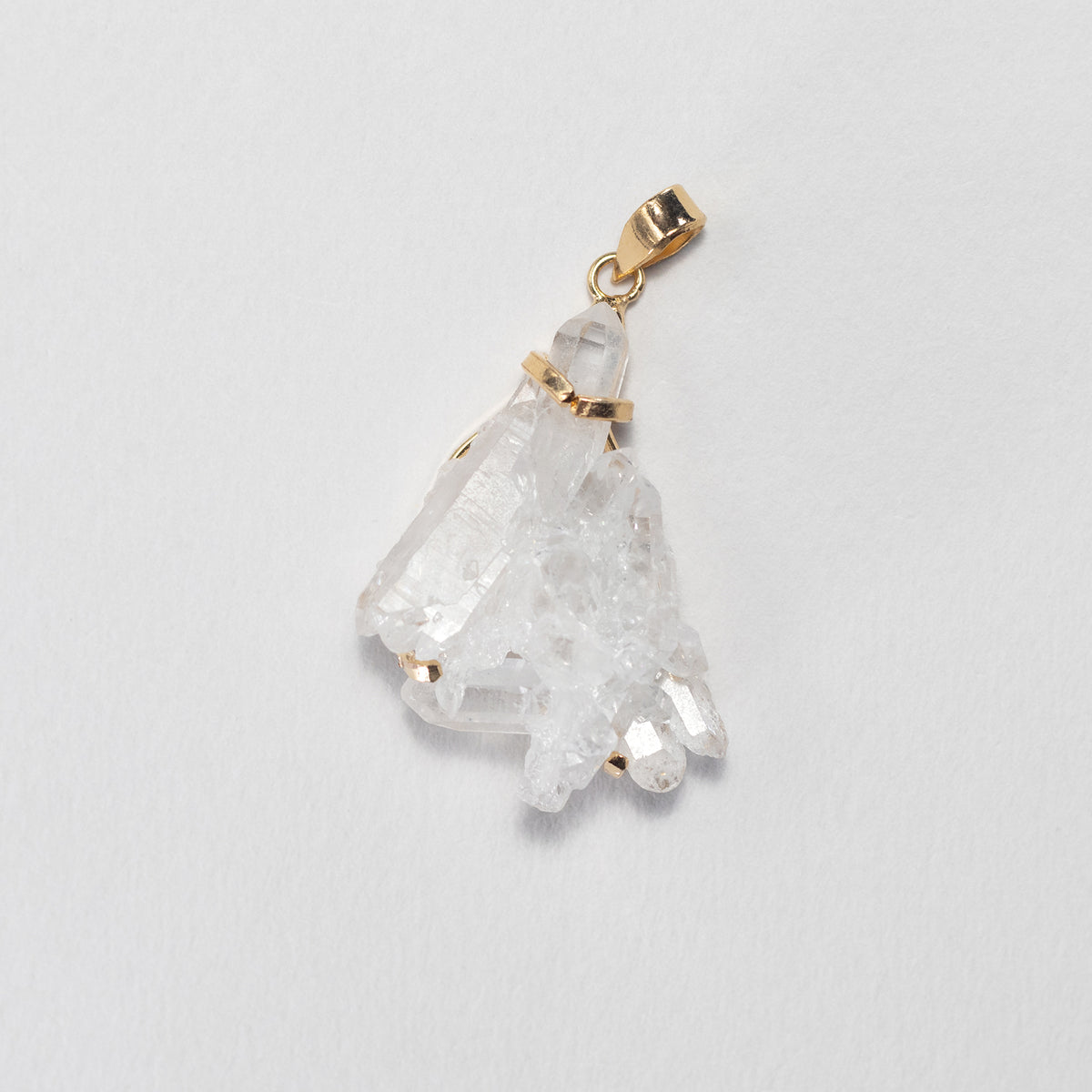 Pendentif en cristal de roche en grappe