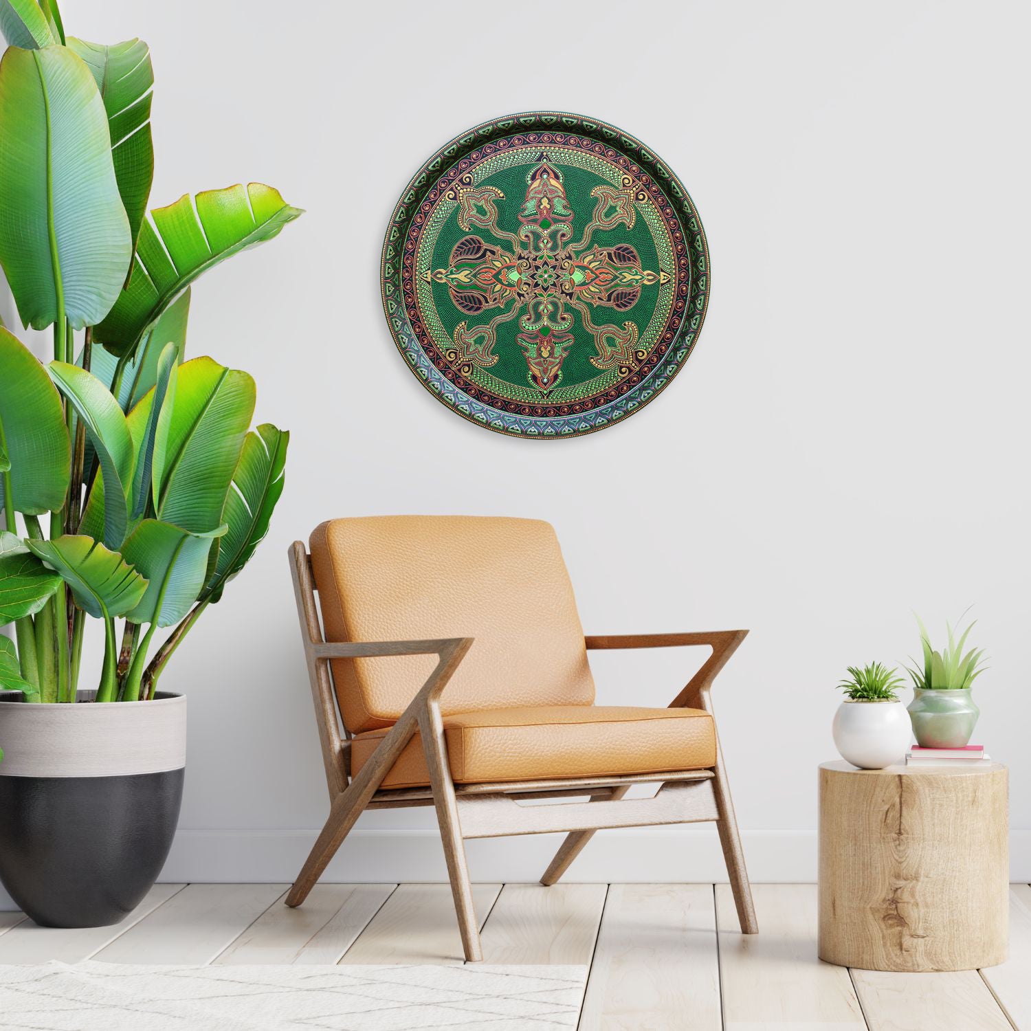 Round metal tray  from Fantasy Forest collection, made in green and gold. Hanging on the white wall above yellow armchair, big plant on the side.