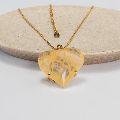 Golden healer faceted heart pendant