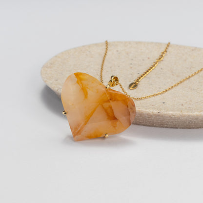 Golden healer faceted heart pendant