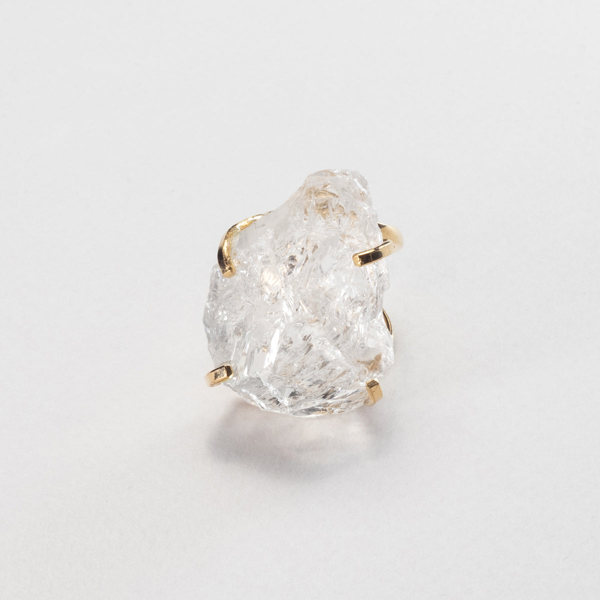 Large raw clear crystal quartz ring