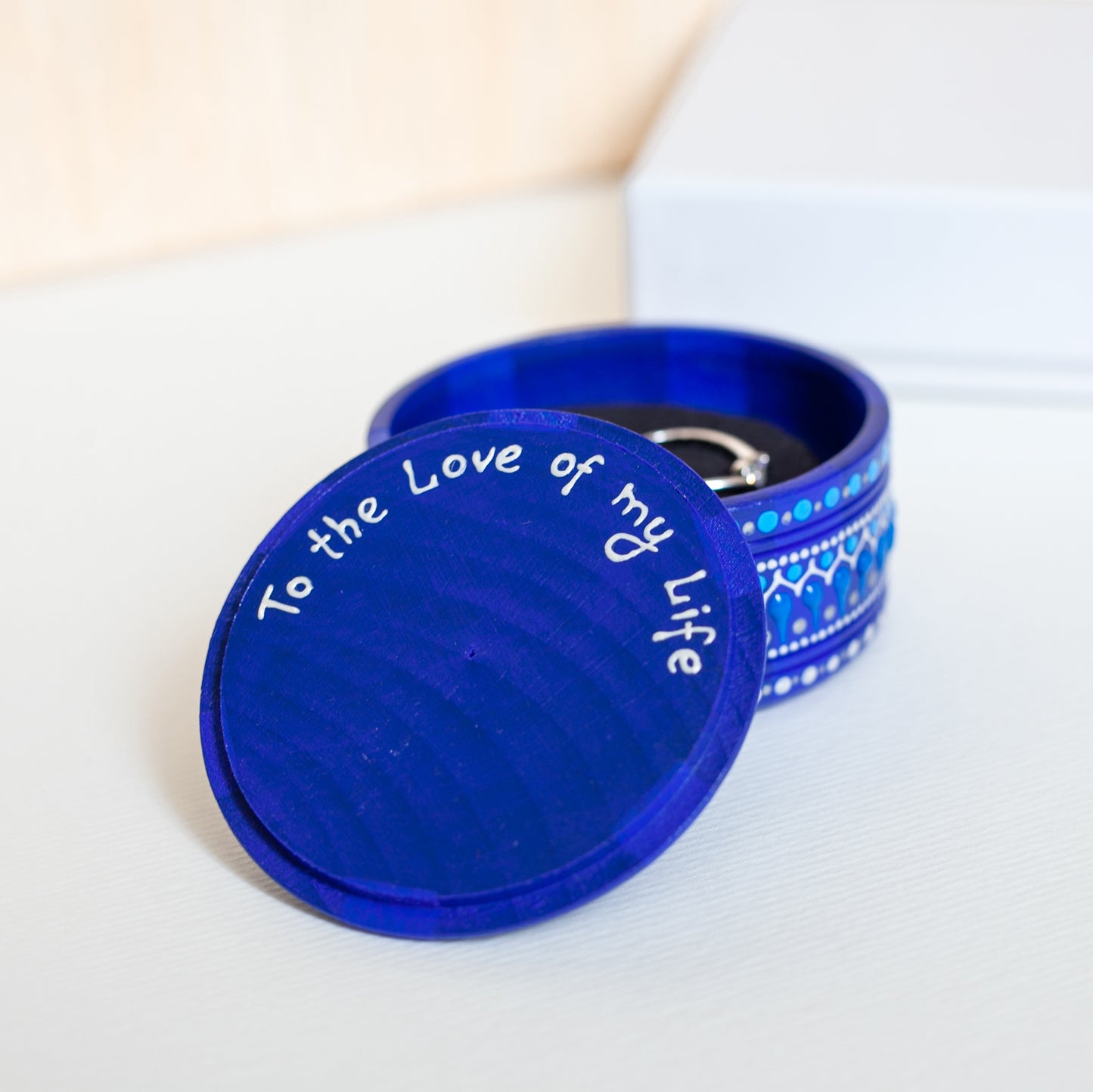 Blue wooden box, the lid is open, personalisation shown