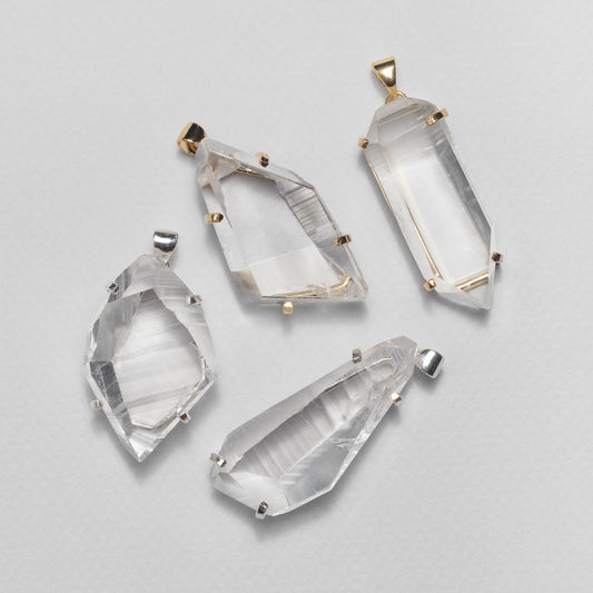 Freeform faceted lemurian crystal pendant