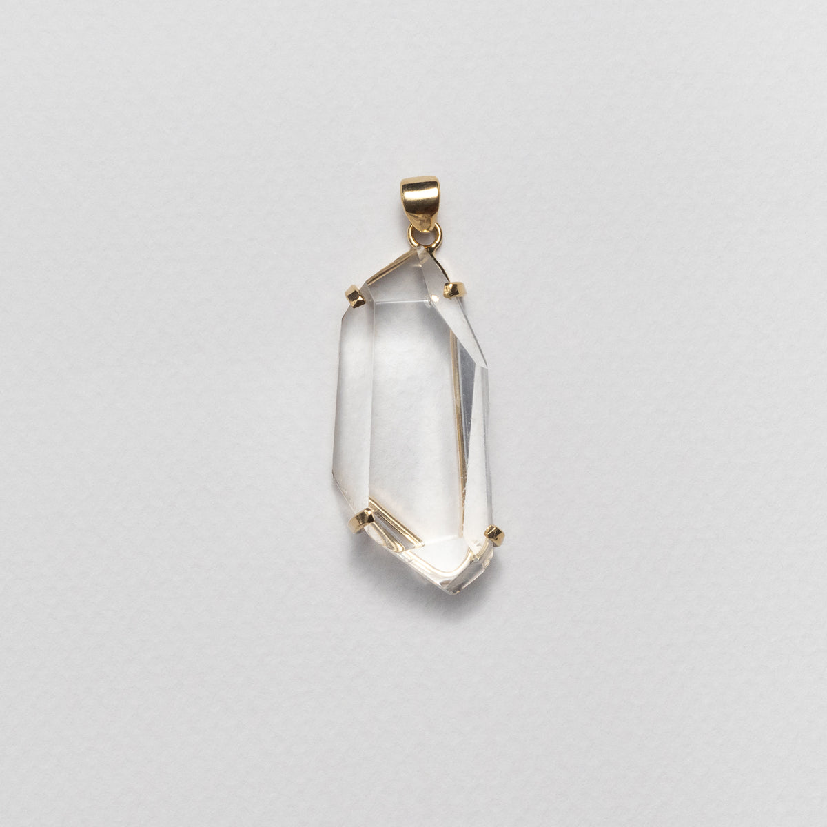 Pendentif en cristal facetté forme libre