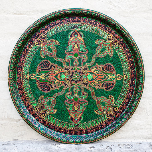 Round metal serving tray for ottoman, from Fantasy Forest collection, made in green and gold. Front view on the white background.