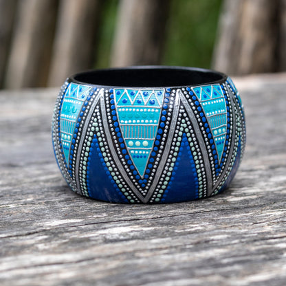 blue wooden bracelet, hand painted in geometric African style